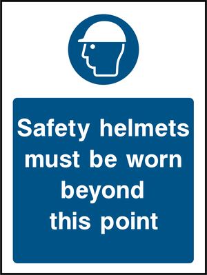 Safety helmets must be worn beyond this point